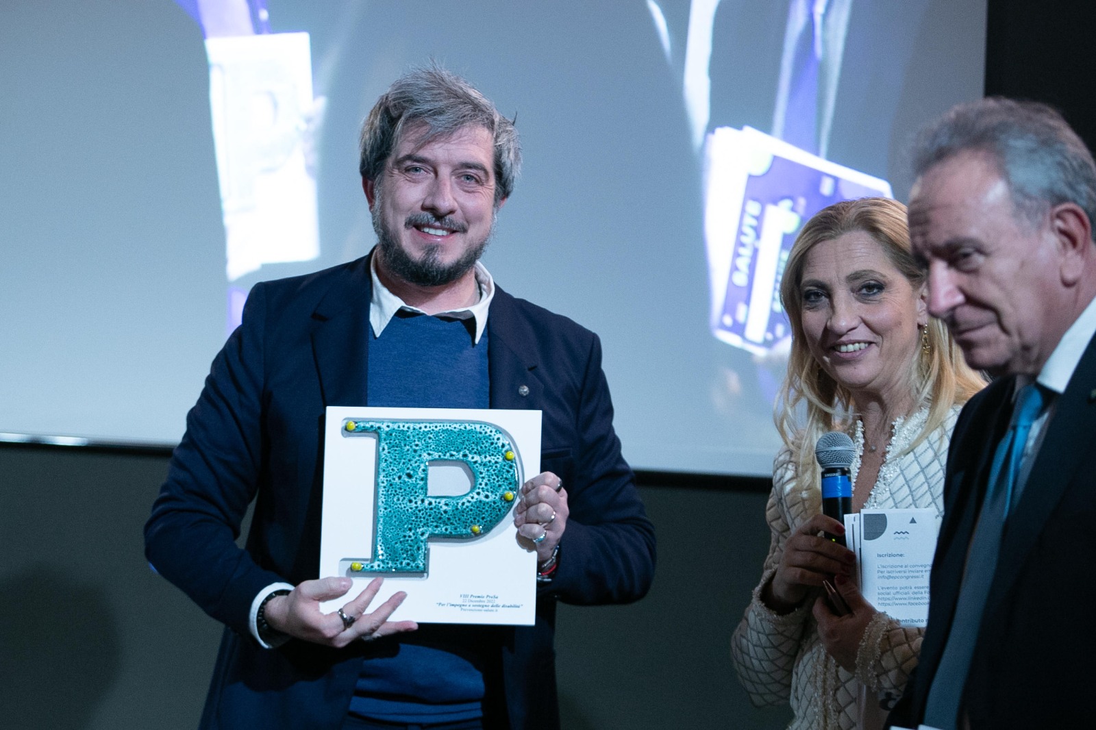 Paolo Ruffini premiato durante la convention PreSa